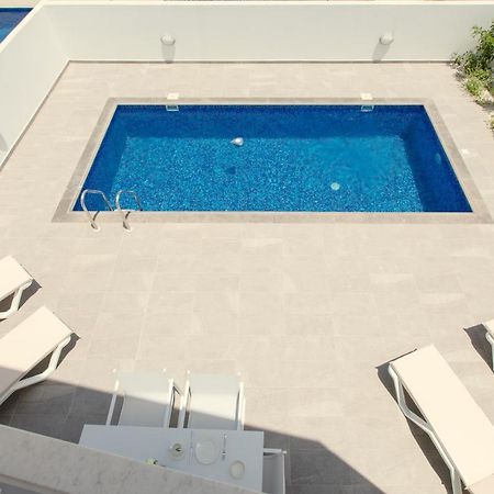 Palm Tree Villas Livadhia Exterior foto