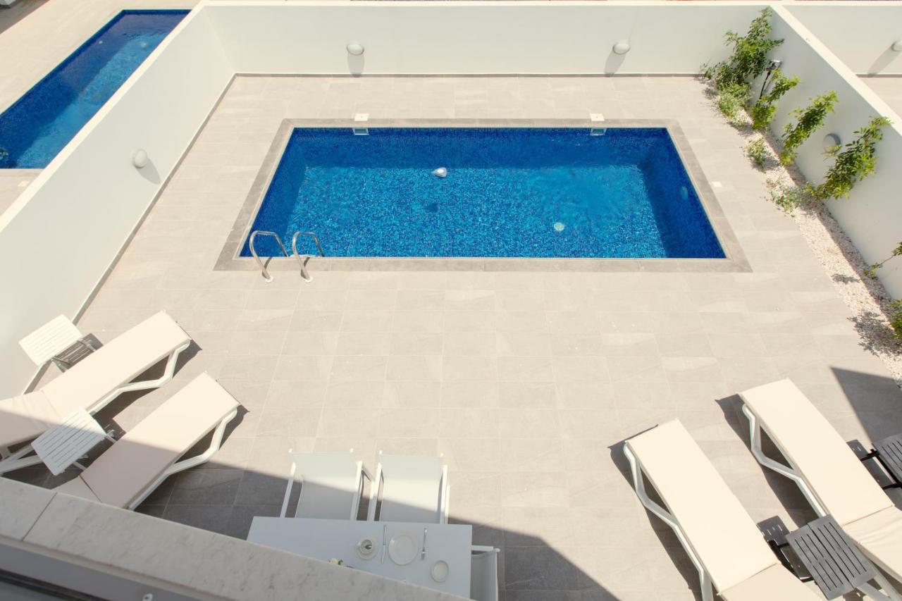 Palm Tree Villas Livadhia Exterior foto